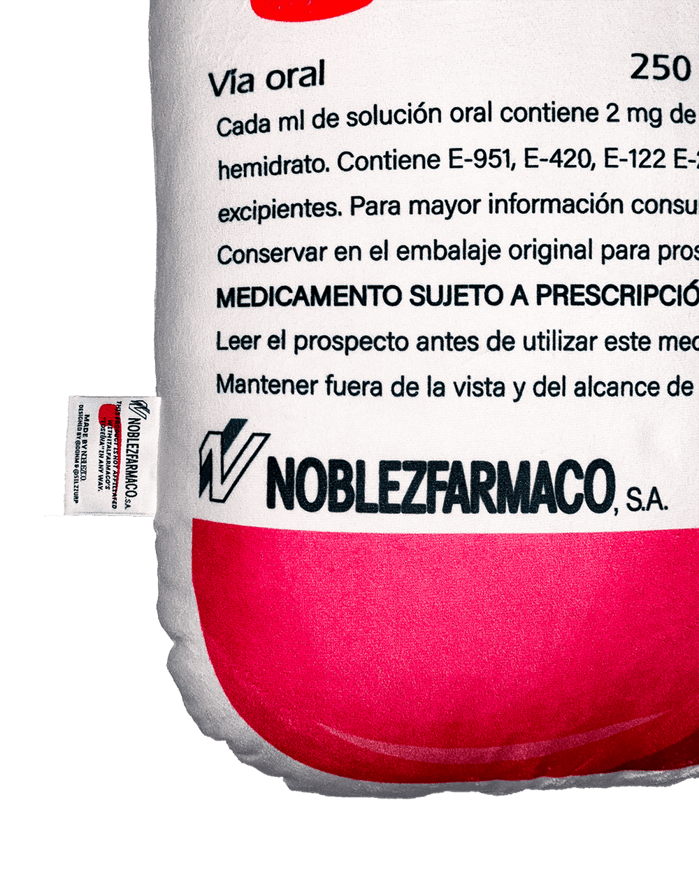 Noblezfarmaco SA Toseina bottle pillow side view 250ml oral solution 2mg prescription medication Spanish text pink red cushion