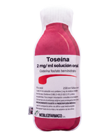 Toseina Pillow front view - plush medicine bottle cushion with Spanish label, pink and white, NOBLEZFARMACO